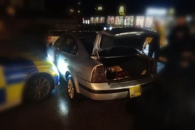 Officers arrested two people following an 'intelligence led intercept' of a silver VW Passat taxi CREDIT: LANCS ROAD POLICE