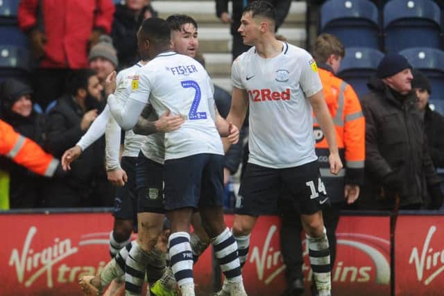 Sean Maguire is congratulated by Darnell Fisher and Jordan Storey after scoring Preston's late winner against Birmingham