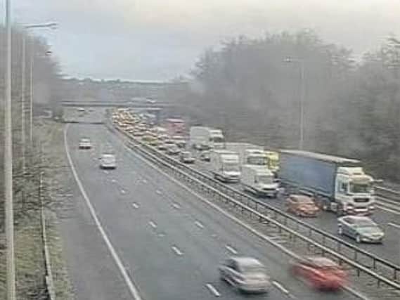 The M6 northbound exit slip road at junction J25 in Wigan remains closed after a fire broke out a timber yard close to the carriageway this morning (March 18).