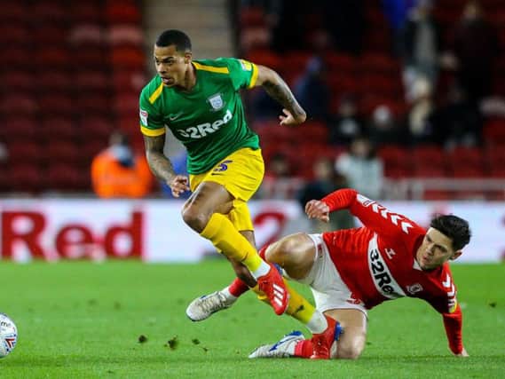 Preston striker Lukas Nmecha evades a challenge from Middlesbrough midfielder Mo Besic