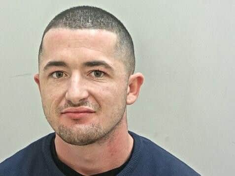 Richard Watkins, 25, is wanted by police after a teenager was attacked by a group of men in Samuel Street at around 11.10pm on Sunday, March 10.