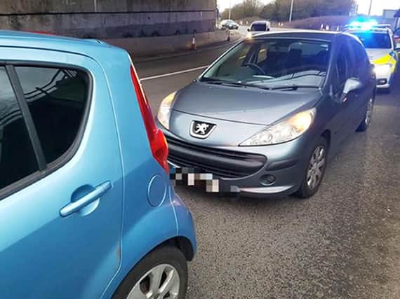 Screen grab from Derbyshire roads policing unit twitter account, showing a two car collision between a Peugeot 207 and a Vauxhall Agila on the A52 roundabout beneath the M1, at 5.30pm on Sunday.