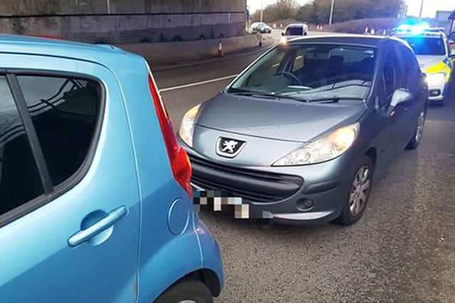 Screen grab from Derbyshire roads policing unit twitter account, showing a two car collision between a Peugeot 207 and a Vauxhall Agila on the A52 roundabout beneath the M1, at 5.30pm on Sunday.