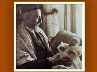 Photo of Zvi David Hoppenstein with baby Harold Levy c1909 features on front cover of 'Candles, Conversions and Class' and is from the collection of Doreen Spevack