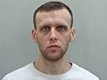 Dean Guest, 31, is wanted by police in Lancashire regarding a number of matters.