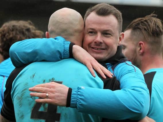 Chorley manager Jamie Vermiglio embraces skipper Andy Teague at full time: Photo credit Josh Vosper