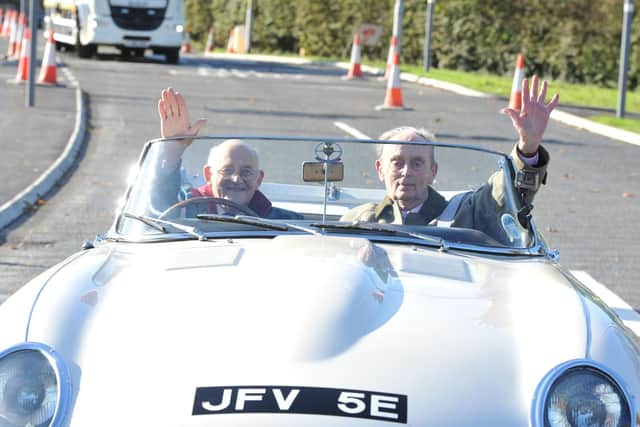 Norman (left) when he became the first driver to use the new Broughton Bypass.