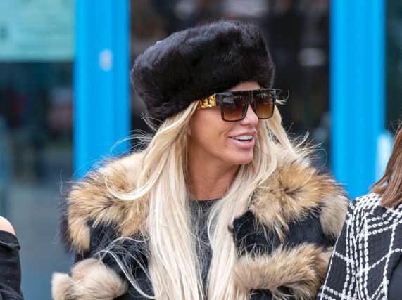 Katie Price leaves Crawley Magistrates' Court where she appeared on two counts of using threatening, abusive, words or behaviour to cause harassment, alarm or distress.