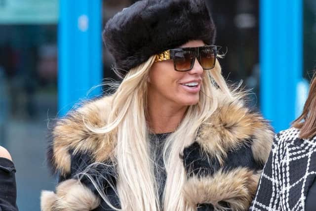 Katie Price leaves Crawley Magistrates' Court where she appeared on two counts of using threatening, abusive, words or behaviour to cause harassment, alarm or distress.