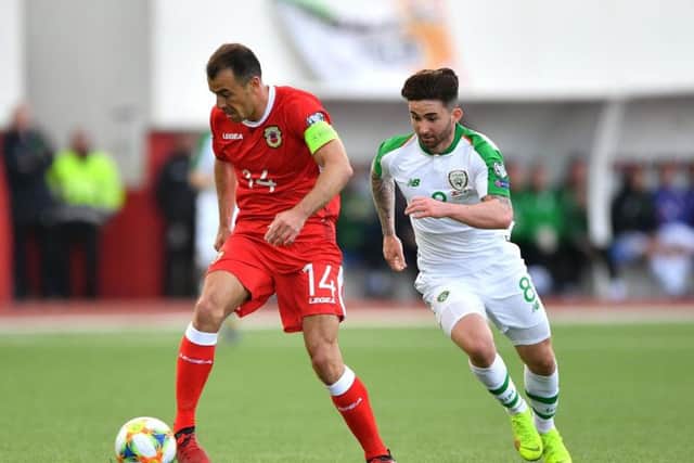 Sean Maguire tracks a Gibraltar's Roy Chipolina in Republic of Ireland's 1-0 win