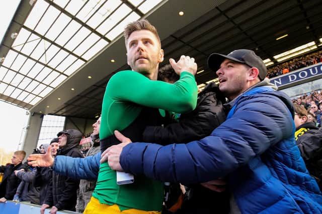 Paul Gallagher gives his shirt to a fan after Preston's 1-0 win at Blackburn