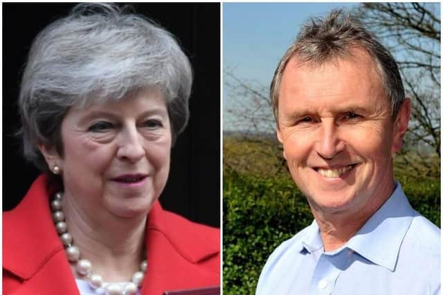 Left Theresa May, right, Nigel Evans