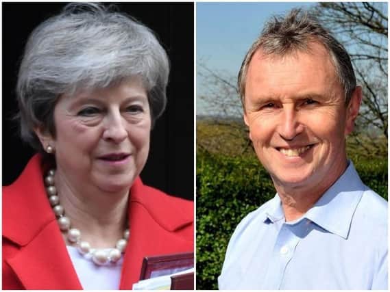 Left Theresa May, right, Nigel Evans