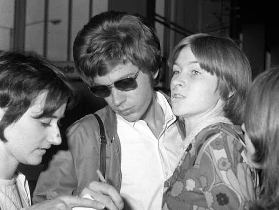 Musician Scott Walker (centre), who has died at the age of 76. Walker was one third of The Walker Brothers and later became a solo artist.