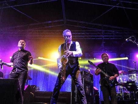 Brian Travers performing with UB40