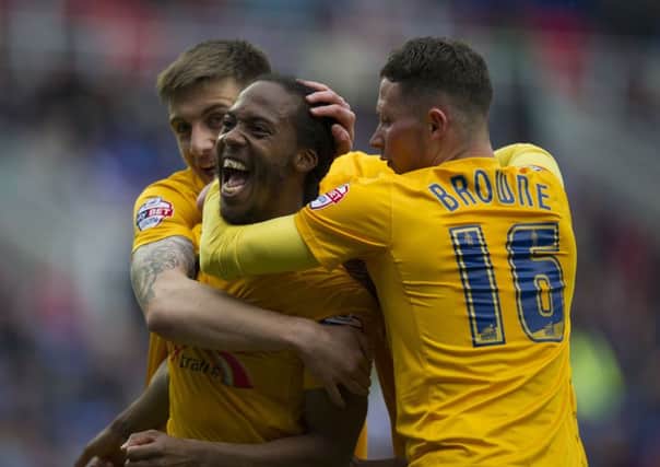 Daniel Johnson is congratulated by Jordan Hugill and Alan Browne after scoring Preston's late winner at Reading in April 2016