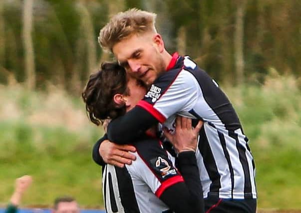 Louis Almond celebrates with Josh Wilson after netting against Leamington (photo: Stefan Willoughby)