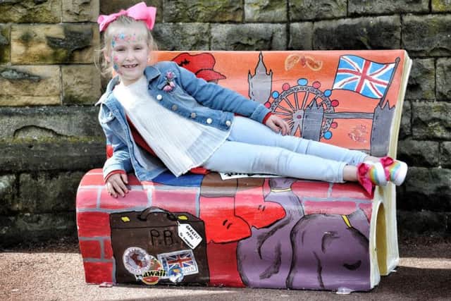 Bethany Westhead (6) on the book bench trail
