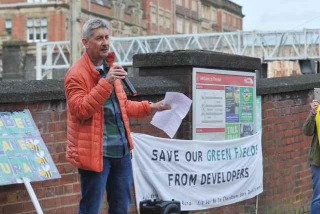Preston resident Graham Eastham speaks at the protest against housing developments in Preston and rural Lancashire