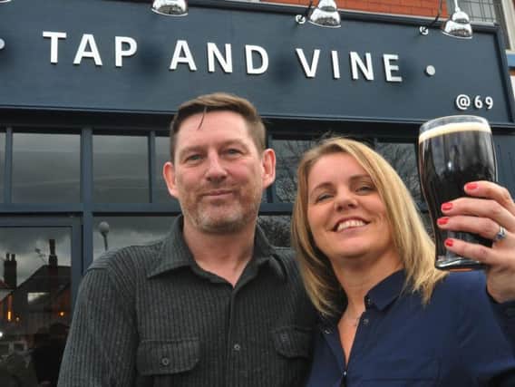 Husband and wife team Jason and Debbie Colles, outside their new bar Tap and Vine, Liverpool Road, Penwortham.