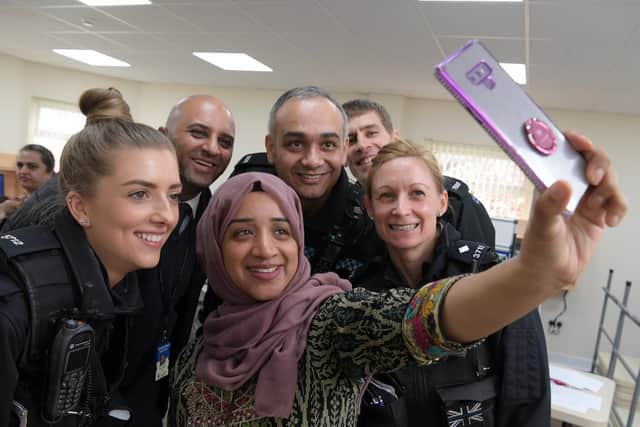Nagina Ali takes a selfie with the neighbourhood policing team