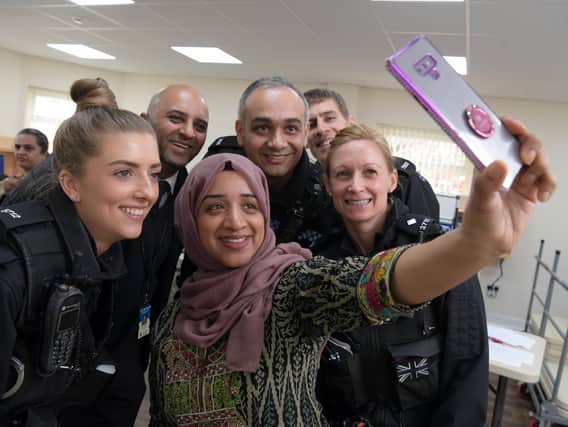 Nagina Ali takes a selfie with the neighbourhood policing team