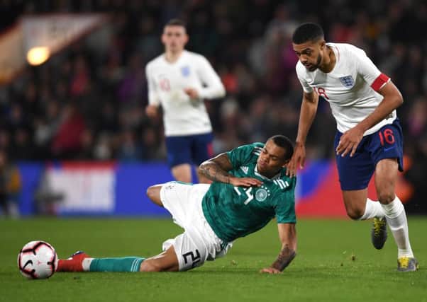 Preston loanee Lukas Nmecha, playing for Germany Under-21s, slides to win the ball ahead of England's Jake Clarke-Slater at Bournemouth (Getty Images)