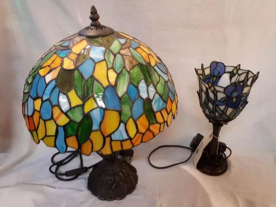 These aren't genuine Tiffany lamps but have been made in a Tiffany style