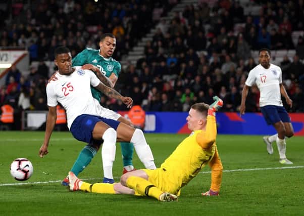 Battling for the ball with England's Ezri Konsa and Dean Henderson (photo: Getty Images)