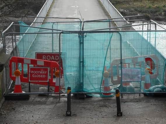 Barriers blocking off the bridge