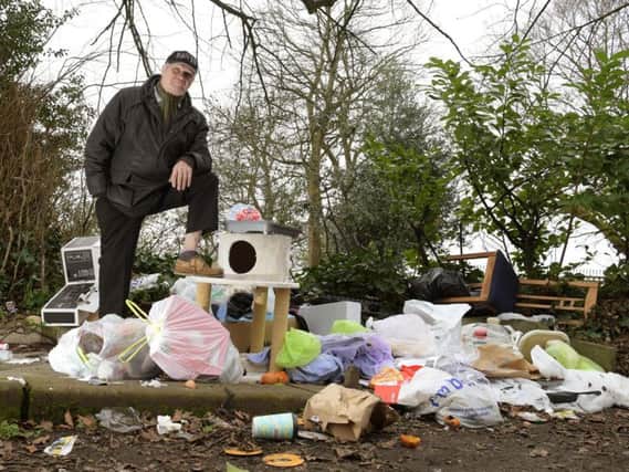 Resident Bernard Forde says rubbish is piling up in Bank Parade after Preston Council took away black bins due to safety issues with the highway (Images: JPIMedia)