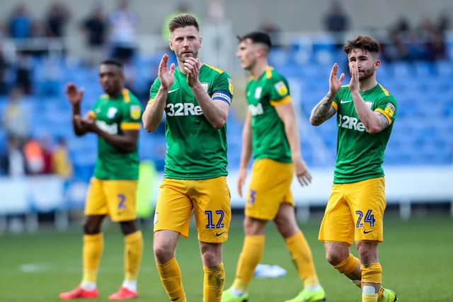 Paul Gallagher and Sean Maguire lead the applause of the Preston fans at the final whistle