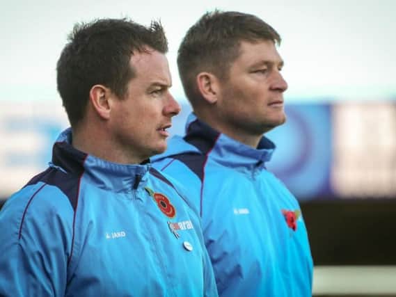 Chorley boss Jamie Vermiglio and coach Jonathan Smith watch on
