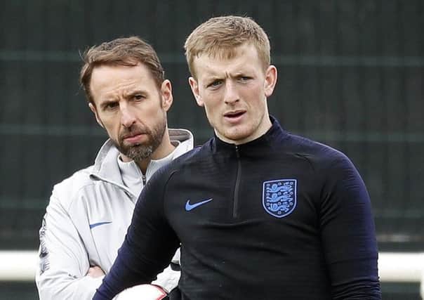 Jordan Pickford and (left) England manager Gareth Southgate