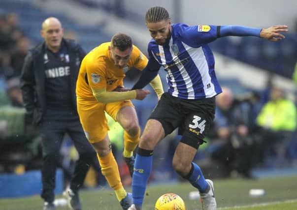In action at Sheffield Wednesday before the injury