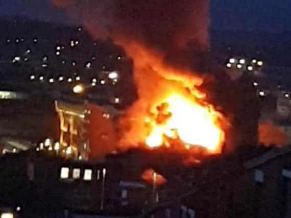 The fire started at an arts centre in the former Church of St John the Evangelist in James Street, Blackburn - the oldest church in the town.