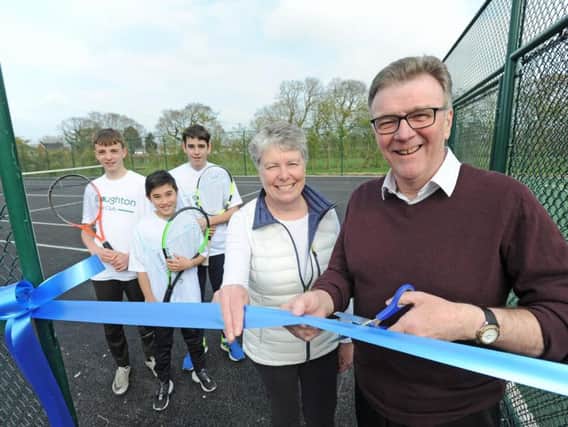 Tennis secretary and vice president Helen Ansted and Radio Lancashire's John Gilmore cut the ribbon with Ben Hollands, Bo Stirrup and Jonathan Parkinson-Sanz behind.
