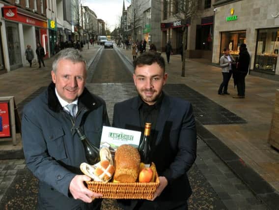 Chairman of City Retail Forum Andrew Stringer, left, and Jonathan Holton, from Preston Business Improvement District, prepare for a new monthly market on Fishergate