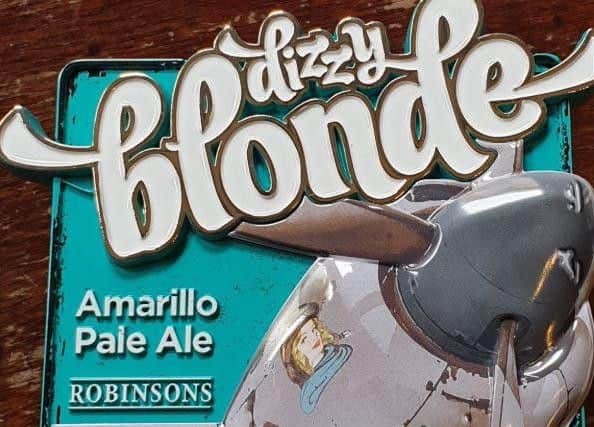 Robinsons Brewery is remarketing its Dizzy Blonde beer and has ditched iconic leggy blonde Peggy in favour of a WW2 bomber.