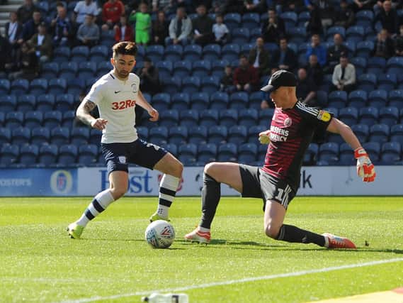Sheffield United's Dean Henderson saves at the feet of Preston North End's Sean Maguire