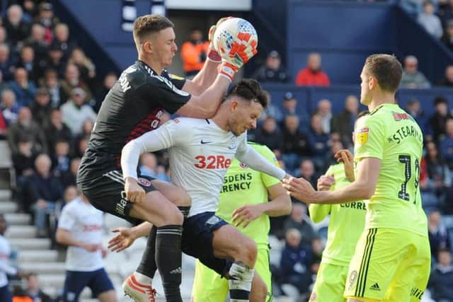 Alan Browne challenges Sheffield United goalkeeper Dean Henderson