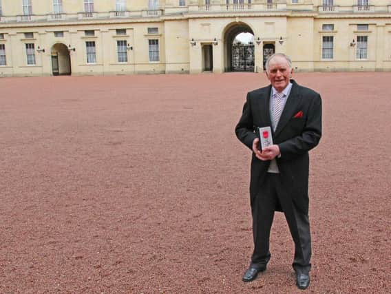 Bernard Rimmer with his MBE outside Buckingham Palace