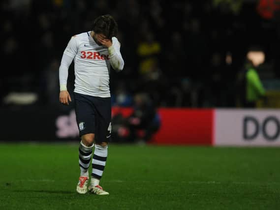 Preston midfielder Ben Pearson heads to the dressing room after his red card against Leeds