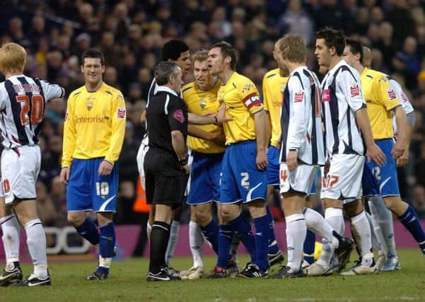 Preston skipper Graham Alexander leads the protests after Danny Dichio is sent off against West Bromwich at The Hawthorns on Boxing Day 2006
