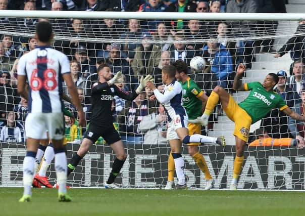 Dwight Gayle's header beats Declan Rudd for his third and WBA's fourth goal