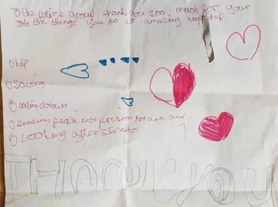 Police have thanked two girls from Ribbleton who ran after a police car to hand officers a self-made "thank you" letter.