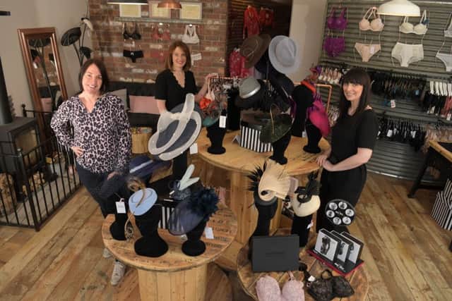Justine Lenehan, Claire Martland and Lucy Smith converted a pig barn into a shop selling hats and lingerie at Hattie Smalls in Bispham Green