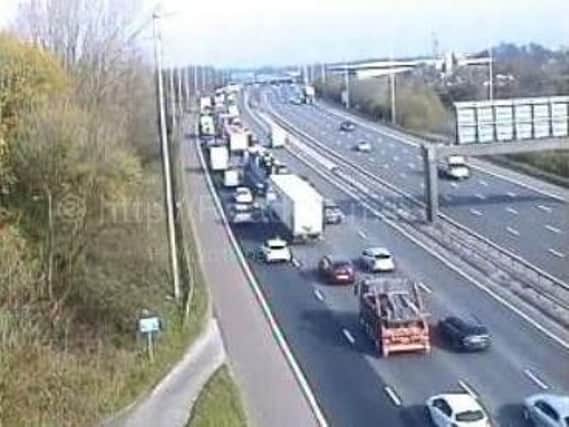 The outside lane of the M6 southbound has been closed between junctions J31A and J31 in Preston after a collision during morning rush hour.