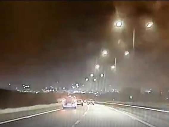 The video has been shared by North West Motorway Police to raise awareness of the dangers of stopping for emergency vehicles in live lanes.
