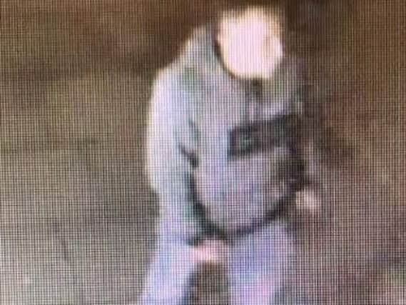 Police want to speak to this man regarding an assault which took place outside the Co-Op Bank in Church Street, Preston on the March, 19. Pic - Lancashire Police